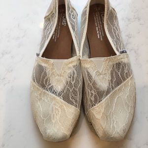 Women’s Toms. White lace. Never worn